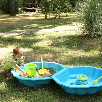 Sabbiera in plastica colarata per bambini a forma di conchiglia